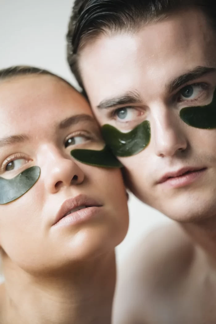 two people wearing voya seaweed eye masks